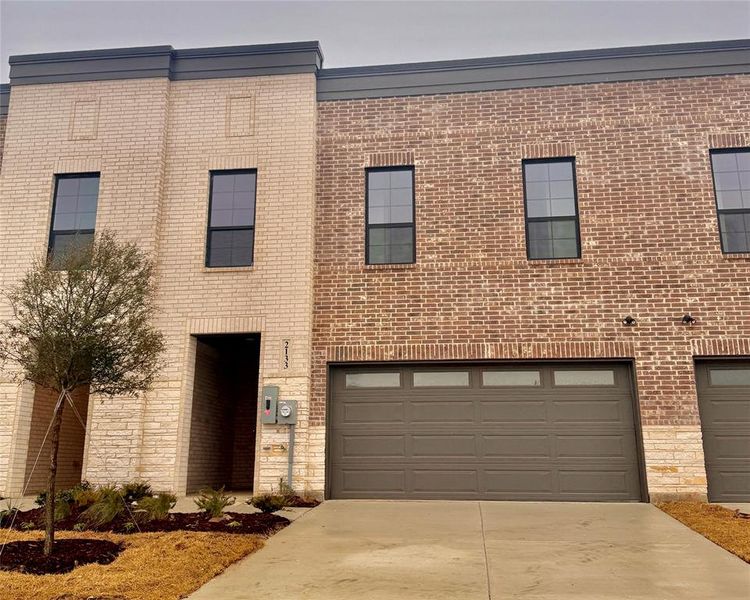 View of front facade with a garage