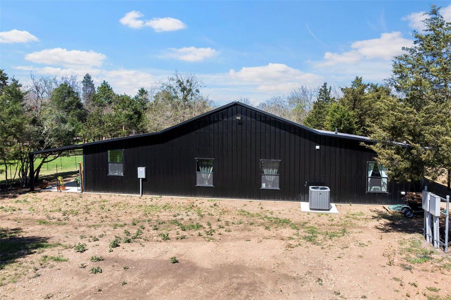 Exterior details and patio area of a home in , Chappell Hill (Image 3).