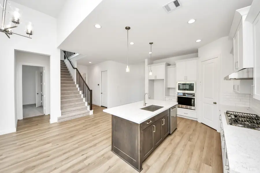 Furnished interior view inside a new home in Marvida, Cypress (Image 5).