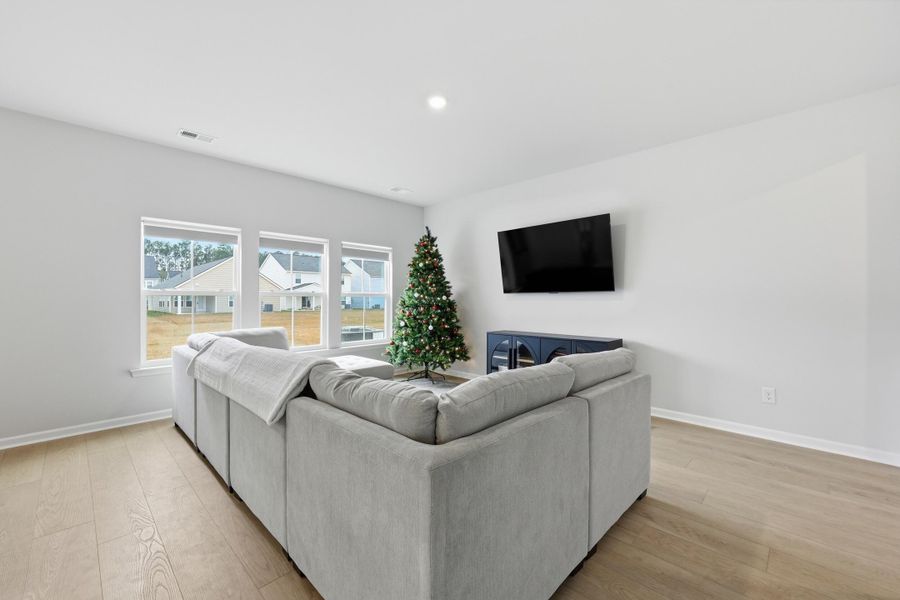 Furnished interior view inside a new home in Sweetgrass at Summers Corner: Carolina Collection, Summerville (Image 11).