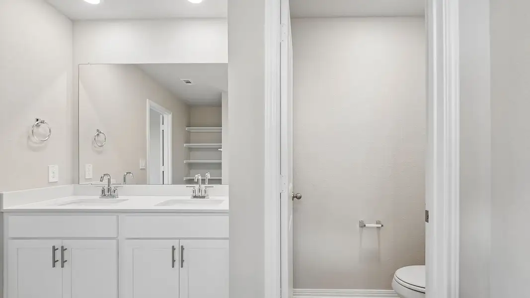 Furnished interior view inside a new home in Carillon, Manor (Image 11).
