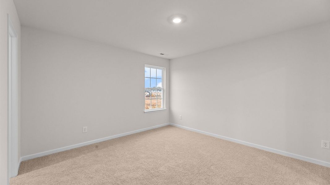 Spacious, unfurnished interior of a new home in East Ridge, Ayden (Image 24).