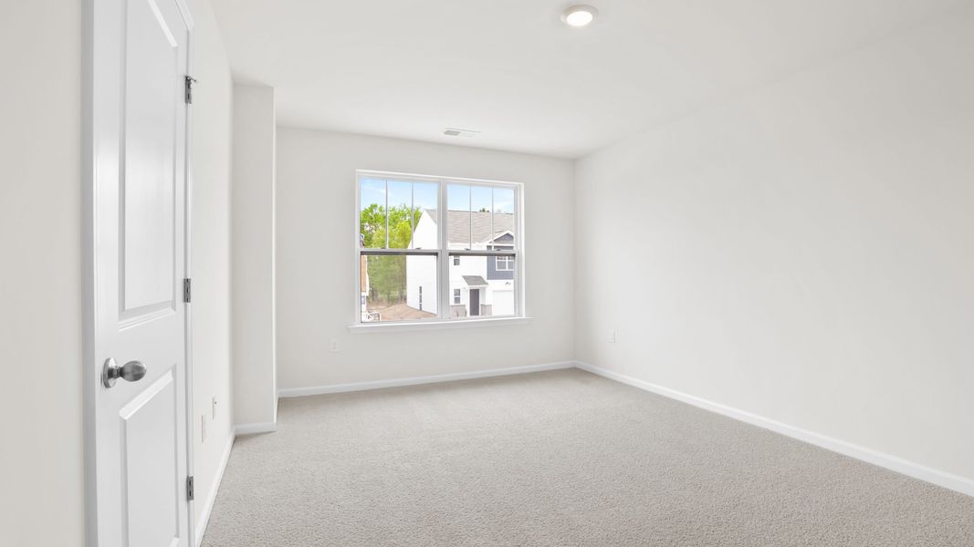 Spacious, unfurnished interior of a new home in Chestnut Ridge Townhomes, Greenville (Image 26).