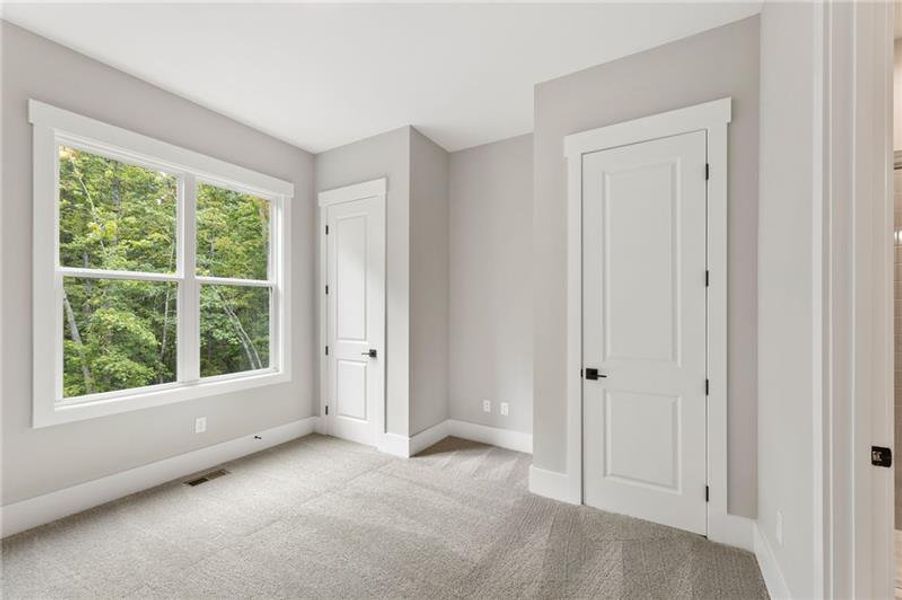 Spacious, unfurnished interior of a new home in Arden on Lanier, Cumming (Image 17).