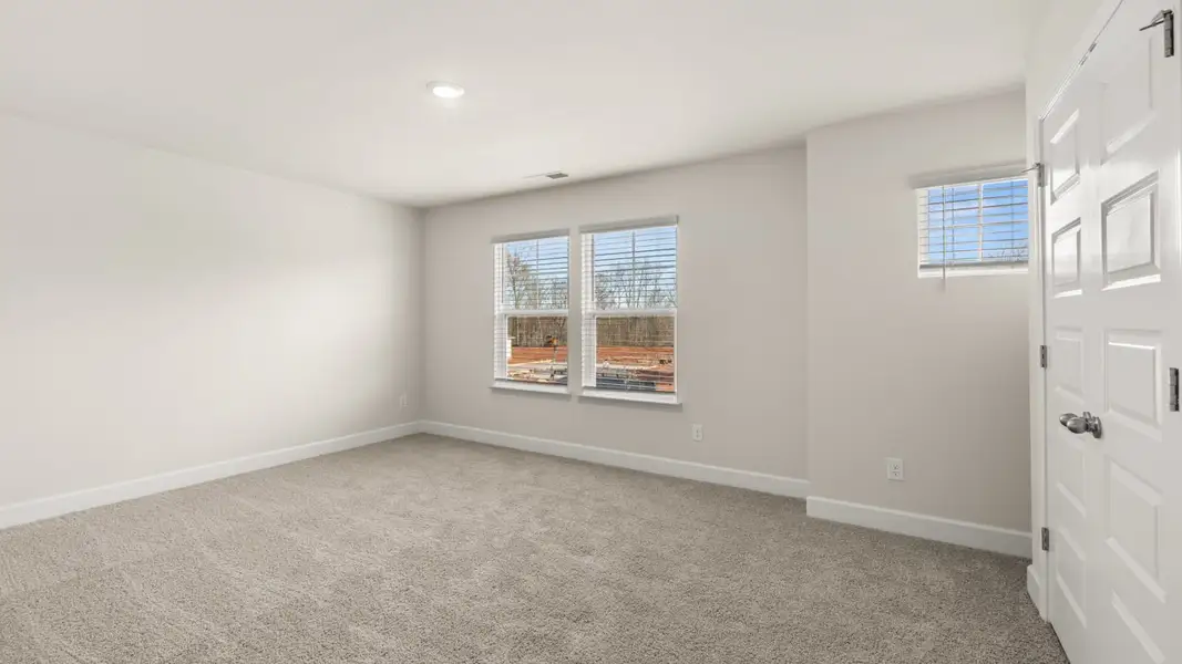 Representative unfurnished interior of a home built from the Hampshire by D.R. Horton in Heritage Pointe, Senoia (Image 33).