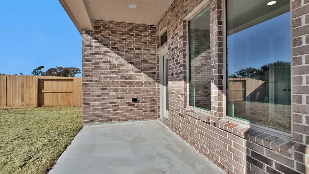 Exterior details and patio area of a home in Candela South, Richmond (Image 4).