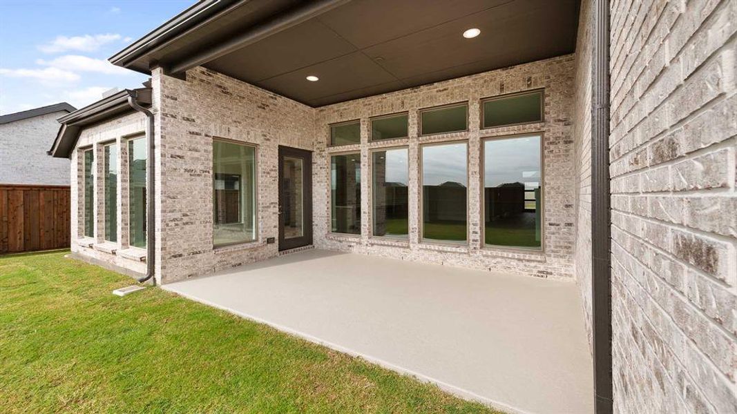 Exterior details and patio area of a home in Myrtle Creek 71', Waxahachie (Image 3).