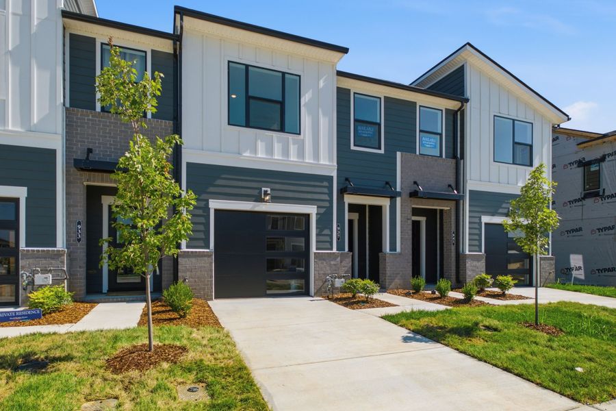 Front exterior of a new home in Nexus Townhomes, Gallatin, TN, highlighting curb appeal (Image 2).