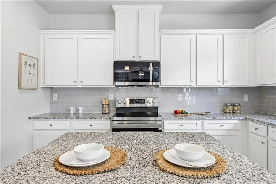 Furnished interior view inside a new home in The Hills at Cedar Creek, Winder (Image 9).