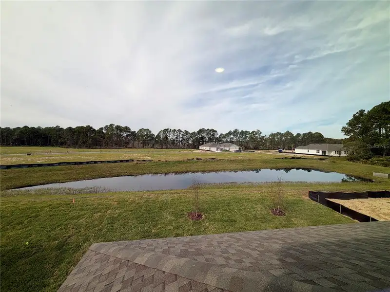 Exterior details and patio area of a home in The Cypress Series at Reserve East, Flagler Beach (Image 3).