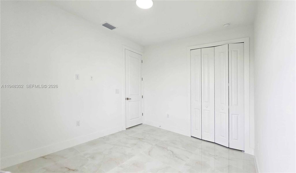 Spacious, unfurnished interior of a new home in , Lehigh Acres (Image 32).