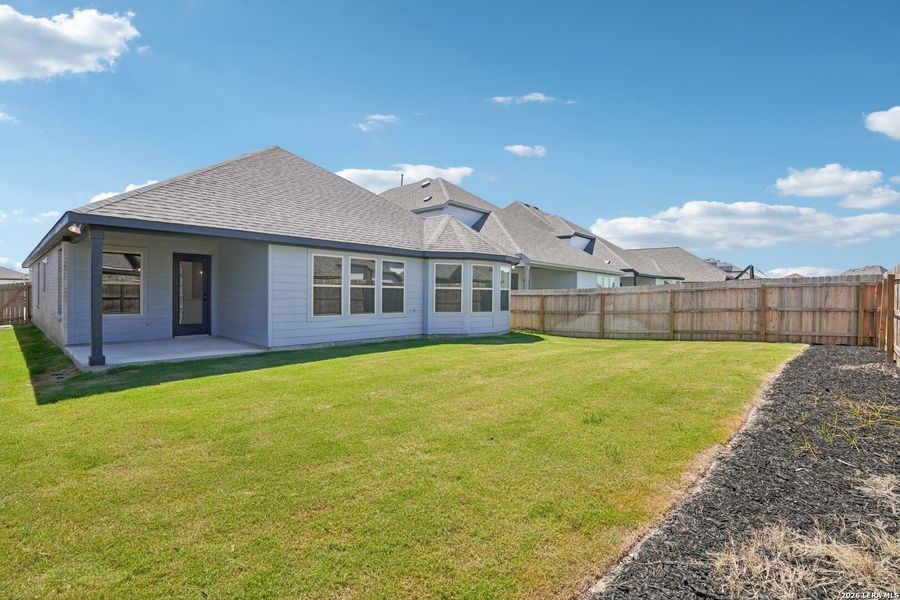 Exterior details and patio area of a home in , New Braunfels (Image 21).