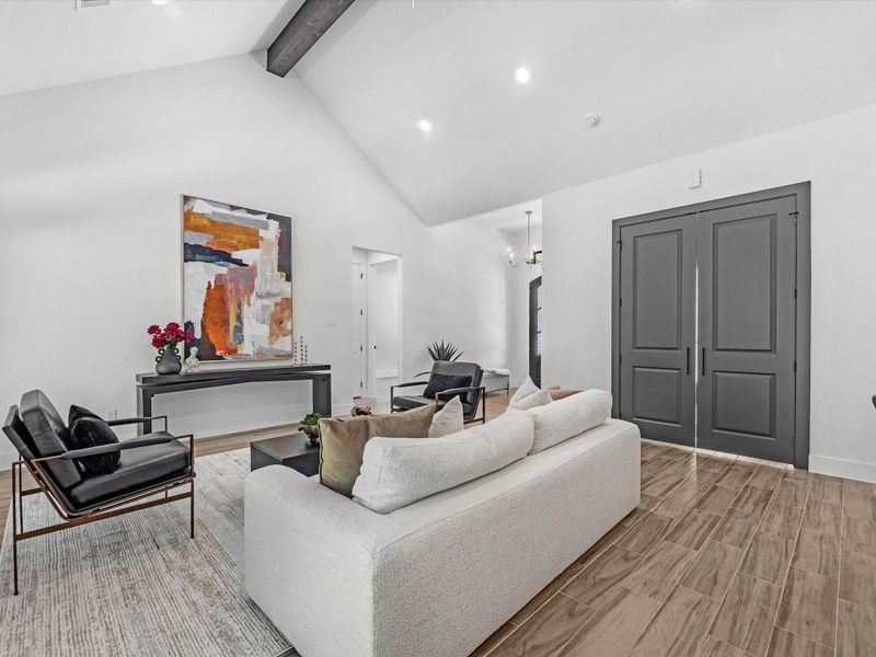 Enjoy the tall ceilings, exposed beams and the contrast of all the colors meshing beautifully