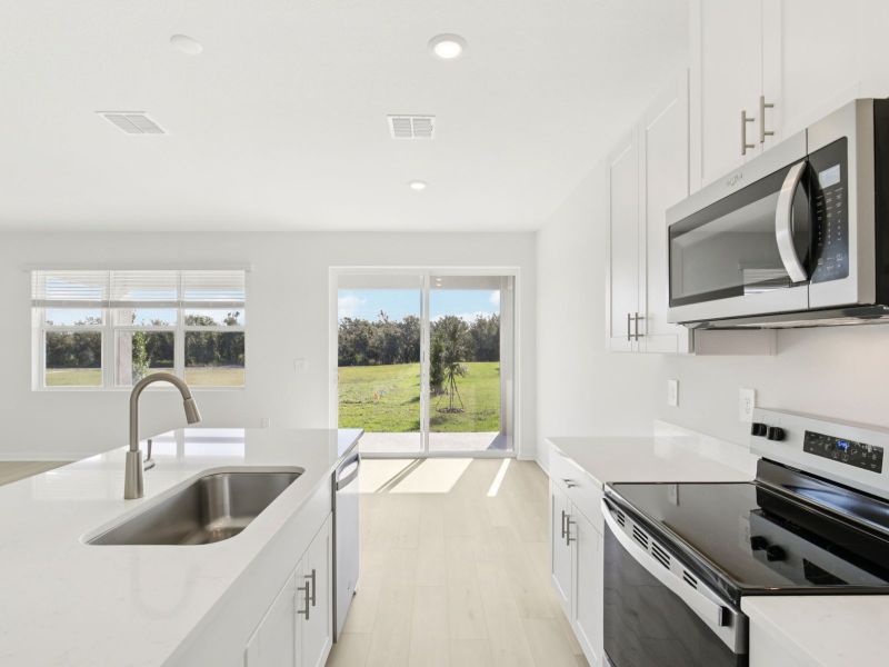 Furnished interior view inside a new home in Coasterra - Reserve Series, Palmetto (Image 8).
