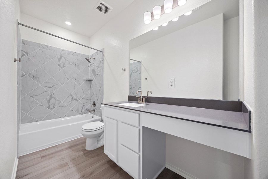 Furnished interior view inside a new home in Salerno - Classic Collection, Round Rock (Image 4). Furnished interior view inside a new home in Salerno - Classic Collection, Round Rock (Image 4).