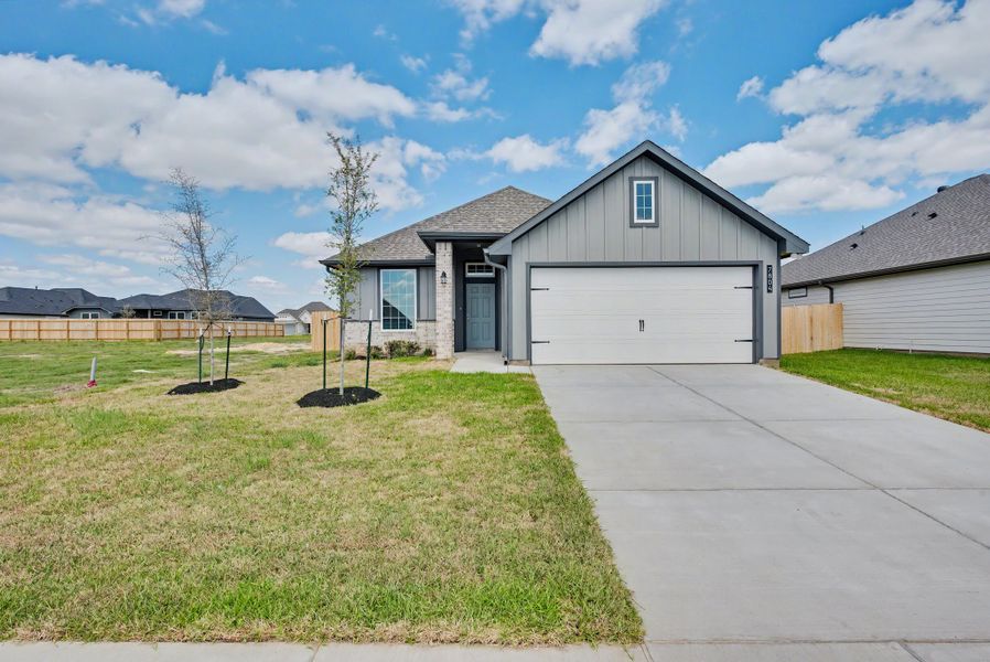Front exterior of a new home in Pecan Grove, Navasota, TX, highlighting curb appeal (Image 1). Front exterior of a new home in Pecan Grove, Navasota, TX, highlighting curb appeal (Image 1).