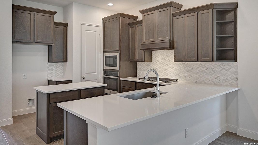 Furnished interior view inside a new home in Kallison Ranch, San Antonio (Image 13).
