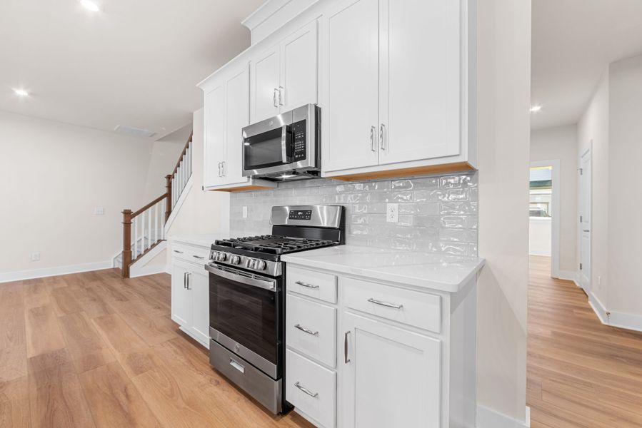 Furnished interior view inside a new home in Seven Oaks, Belmont (Image 7).
