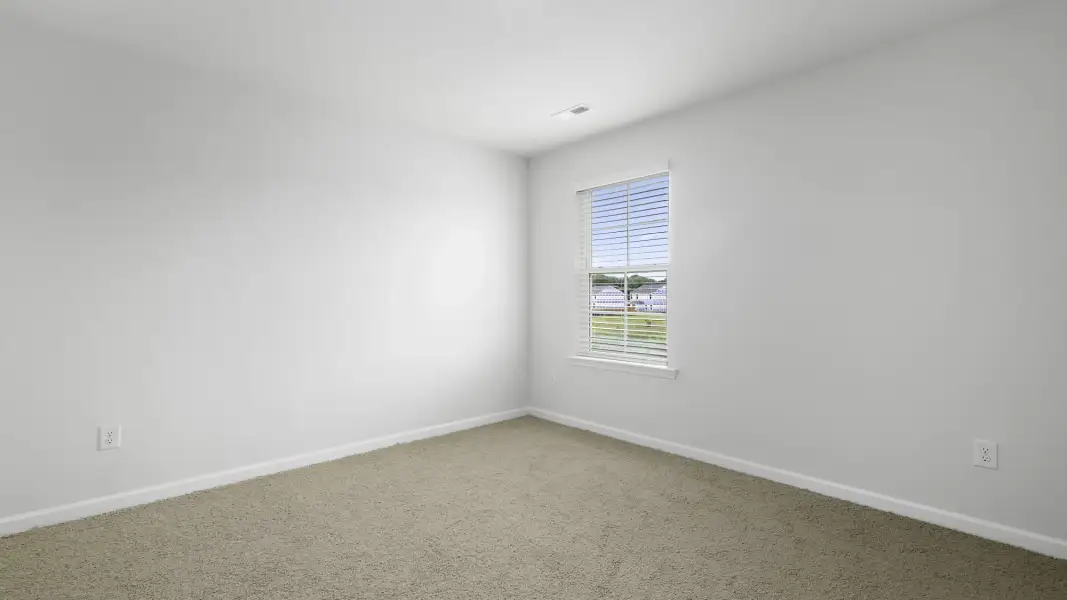 Spacious, unfurnished interior of a new home in Neal Place, Stokesdale (Image 14).