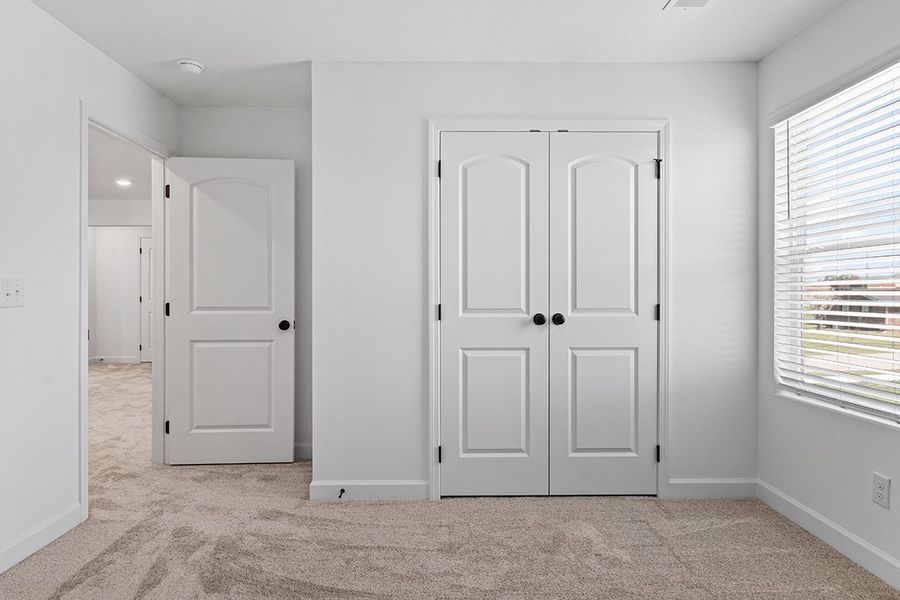 A room with white doors.