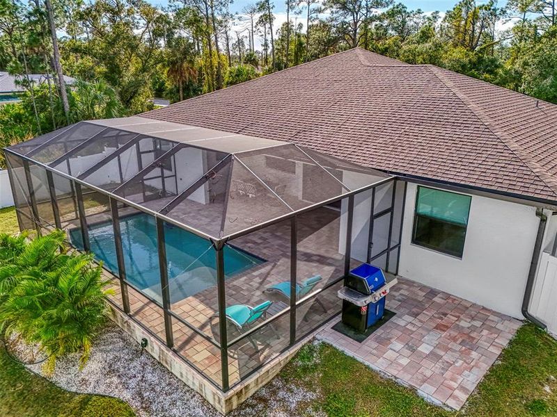 Exterior details and patio area of a home in , North Port (Image 31).