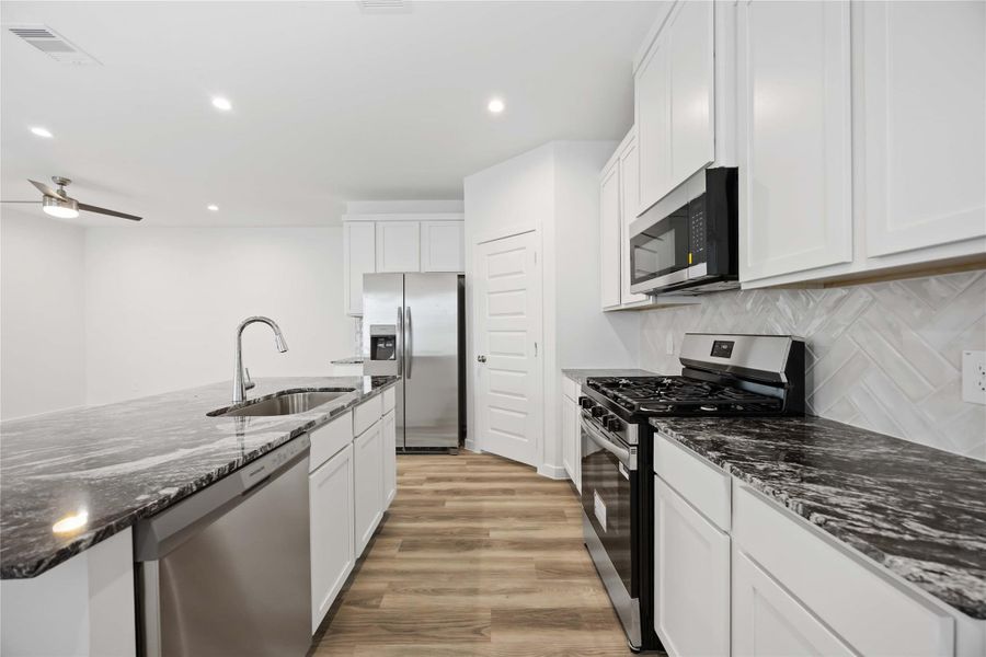 Furnished interior view inside a new home in Grand West, Houston (Image 4).