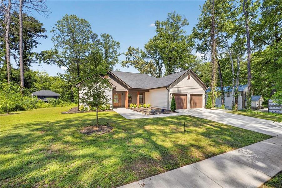 Front exterior of a new home in , Tucker, GA, highlighting curb appeal (Image 31).