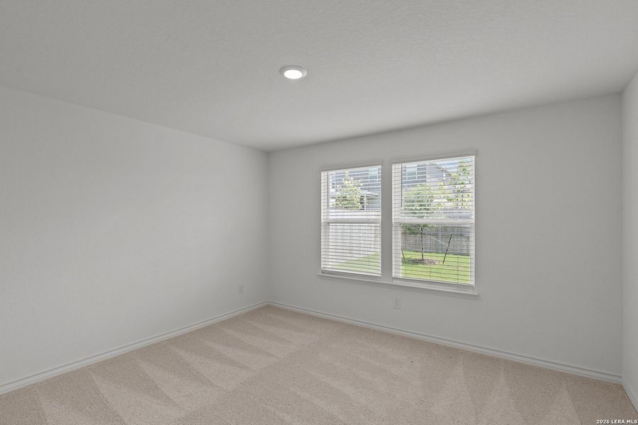 Spacious, unfurnished interior of a new home in The Overlook at Creekside, New Braunfels (Image 12).