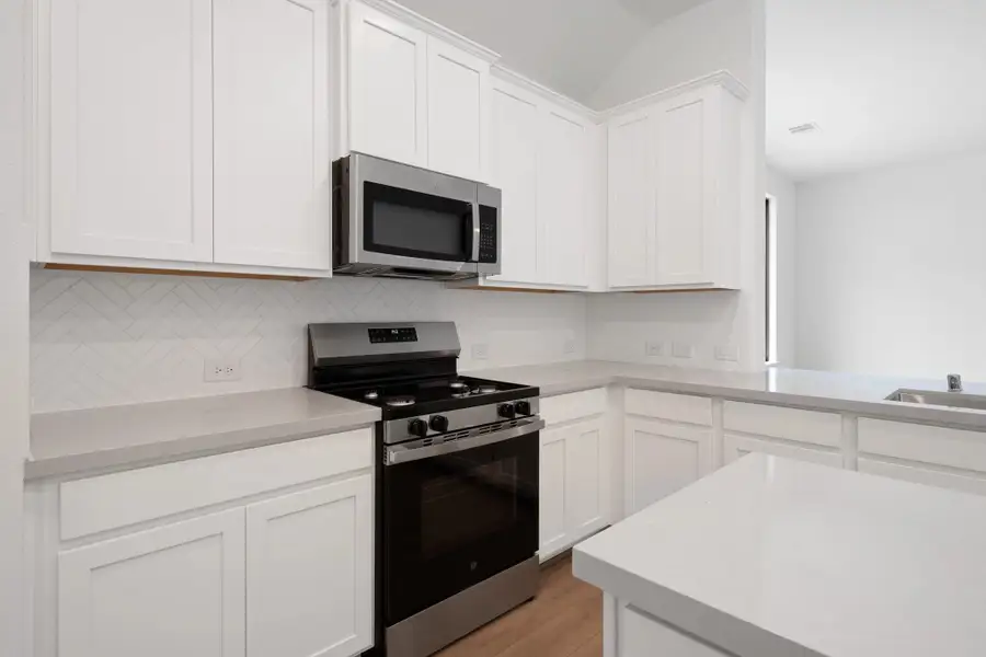 Furnished interior view inside a new home in Spring Creek Trails, Magnolia (Image 3).