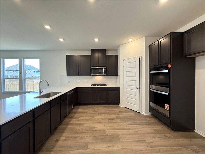 Furnished interior view inside a new home in River Bluff, Leander (Image 10). Furnished interior view inside a new home in River Bluff, Leander (Image 10).