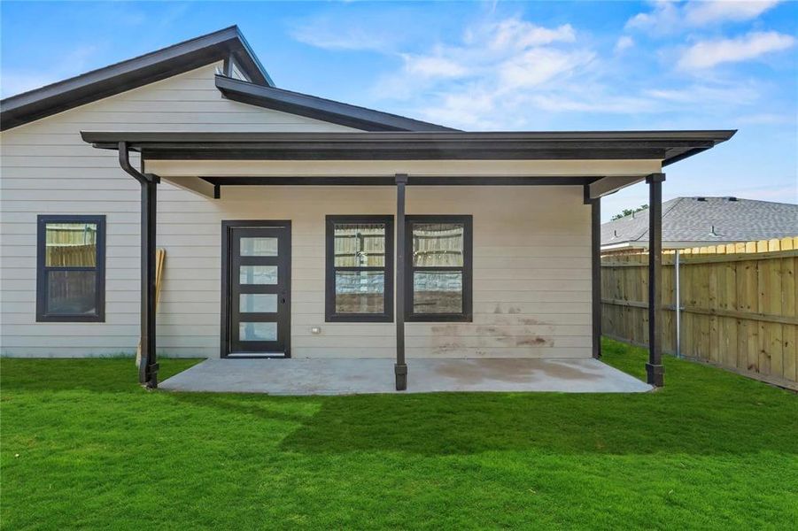 Back of property with a patio Back of property with a patio
