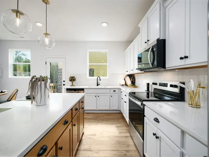 Furnished interior view inside a new home in Dukes Ridge, Charlotte (Image 4).
