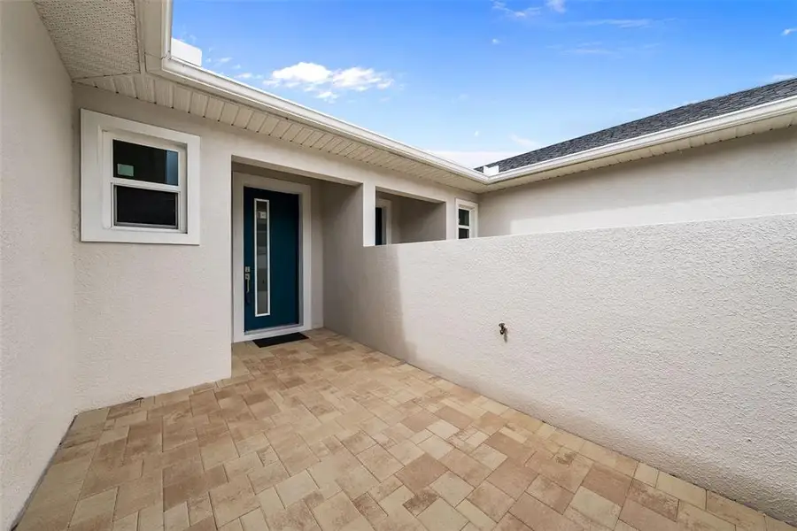 Exterior details and patio area of a home in , Tarpon Springs (Image 33).
