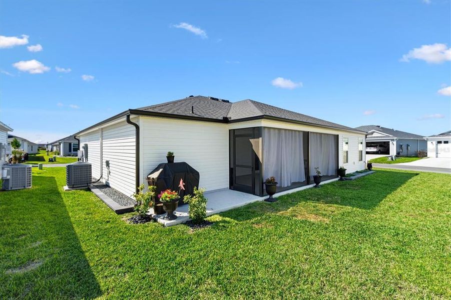 Exterior details and patio area of a home in , The Villages (Image 24).