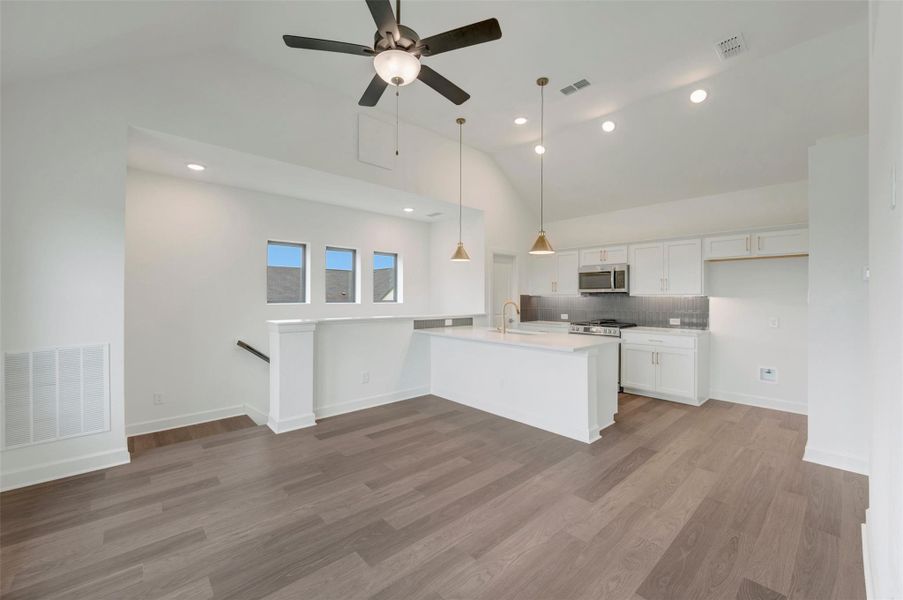 Furnished interior view inside a new home in Riceland - Enclave Row Collection, Mont Belvieu (Image 12).