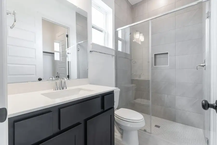 Furnished interior view inside a new home in Lariat - 70', Liberty Hill (Image 4).