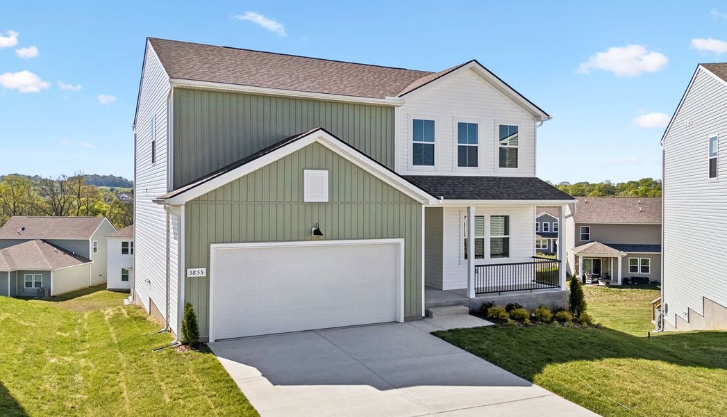 Front exterior of a new home in Highlands of Carter's Station, Columbia, TN, highlighting curb appeal (Image 1). Front exterior of a new home in Highlands of Carter's Station, Columbia, TN, highlighting curb appeal (Image 1).