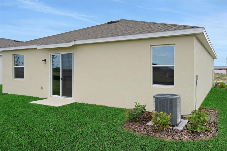 Exterior details and patio area of a home in Annabelle Estates, Lake Wales (Image 18).