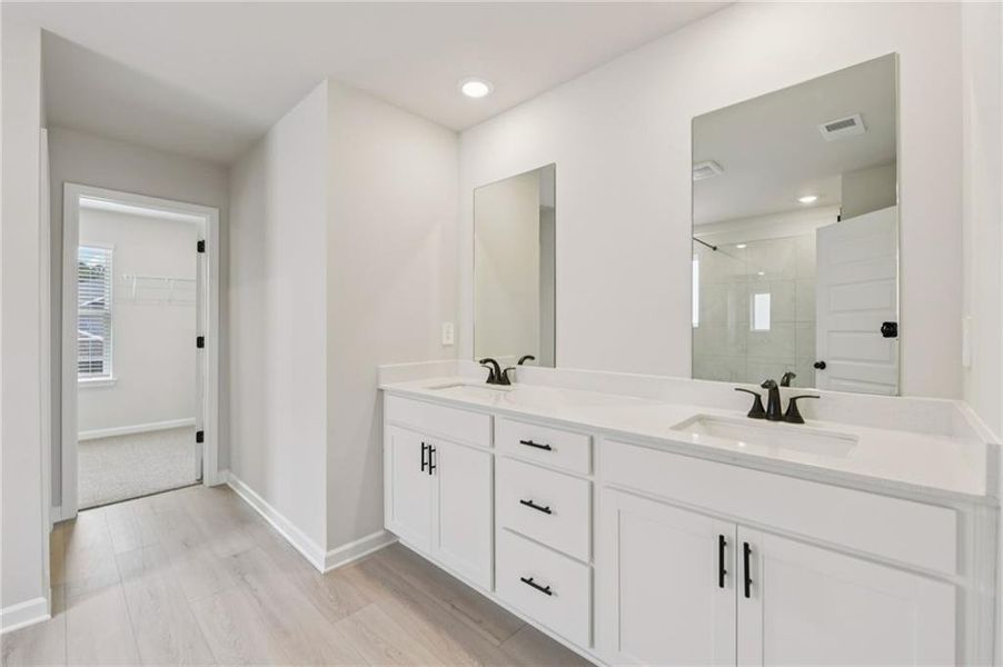 Furnished interior view inside a new home in Vines at Mill Creek - Estate Series, Braselton (Image 10). Furnished interior view inside a new home in Vines at Mill Creek - Estate Series, Braselton (Image 10).