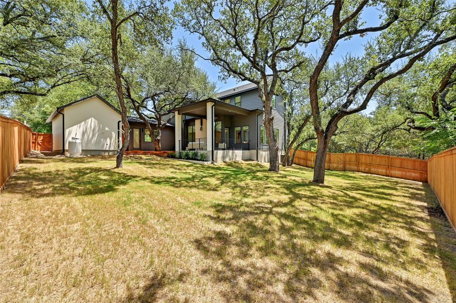 Spacious fenced in back yard. Spacious fenced in back yard.