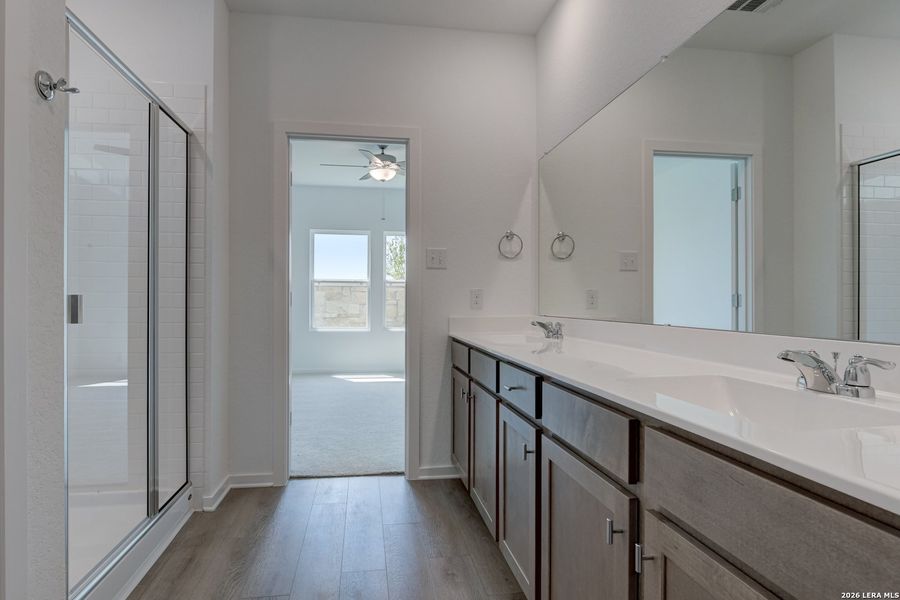 Furnished interior view inside a new home in Hennersby Hollow, San Antonio (Image 13).
