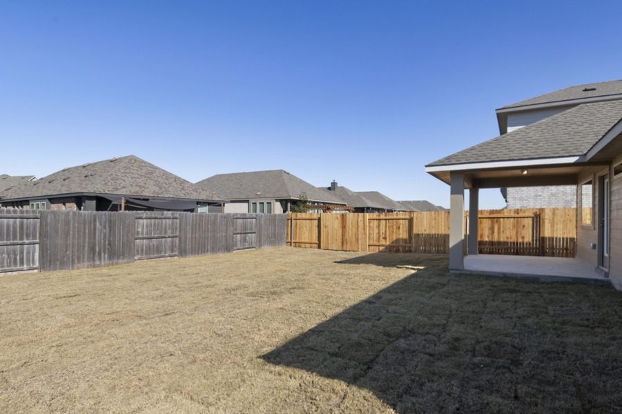 Exterior details and patio area of a home in Crosswinds, Kyle (Image 17).