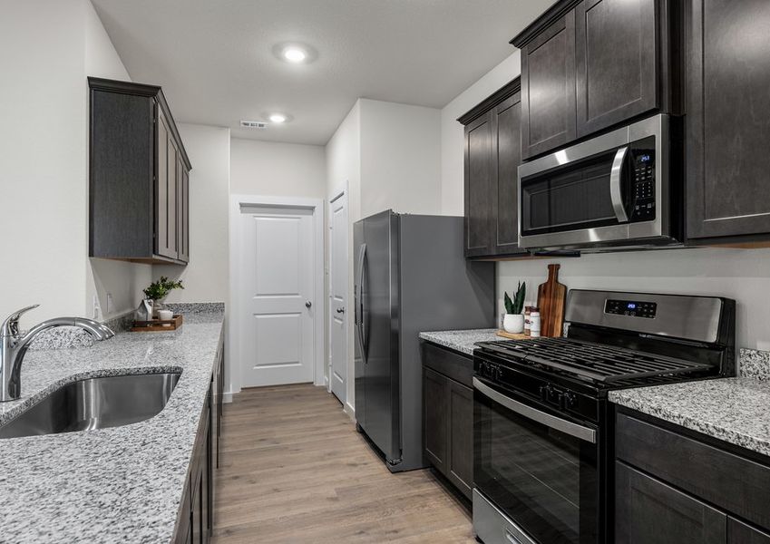 The kitchen has beautiful wood cabinetry. The kitchen has beautiful wood cabinetry.