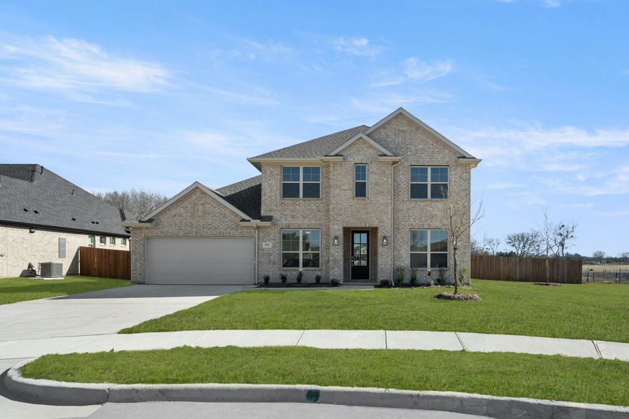Front exterior of a new home in Kentsdale Farms, DeSoto, TX, highlighting curb appeal (Image 1). Front exterior of a new home in Kentsdale Farms, DeSoto, TX, highlighting curb appeal (Image 1).
