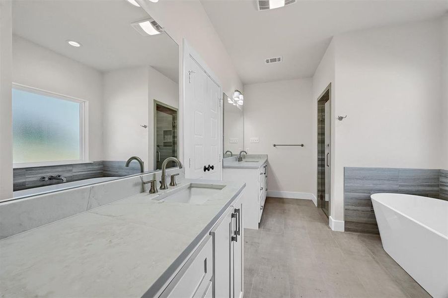 Bathroom with separate shower and tub and vanity