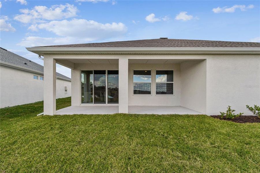 Exterior details and patio area of a home in Coasterra, Palmetto (Image 26).