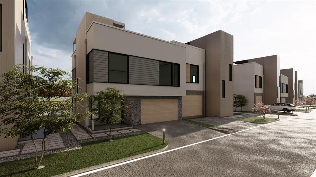 Modern home with stucco siding, an attached garage, and driveway