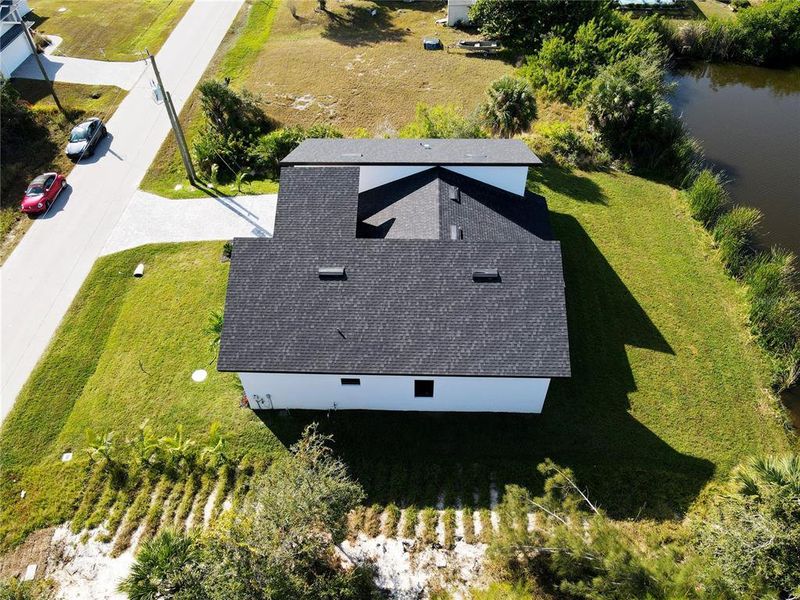 Front exterior of a new home in , Port Charlotte, FL, highlighting curb appeal (Image 23). Front exterior of a new home in , Port Charlotte, FL, highlighting curb appeal (Image 23).