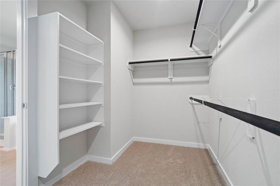 Look at this immaculate closet! With high shelving, multiple rows to hang clothing, you are sure to have enough room for all your belongings!