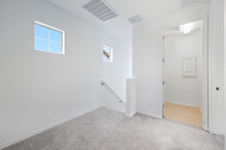 Spacious, unfurnished interior of a new home in Hawes Crossing, Mesa (Image 17).